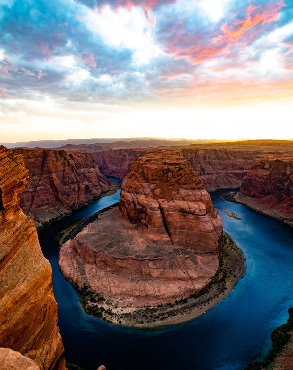 Horseshoe Bend view near Grand Canyon Visitor's Center with river and canyon landscape.