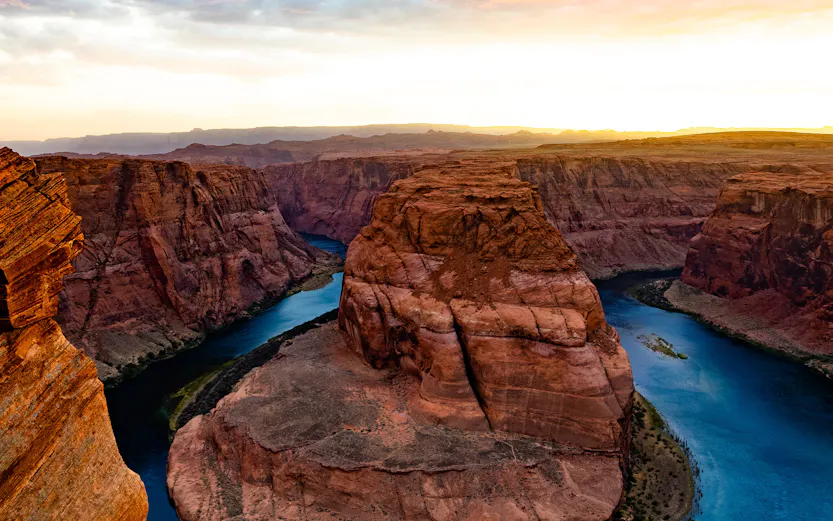 Horseshoe Bend view near Grand Canyon Visitor's Center with river and canyon landscape.