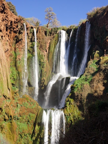 Ouzoud Waterfalls cascading over rocky cliffs in Morocco.