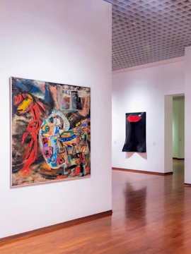 Abstract paintings displayed in a gallery at GAM Torino, Turin.
