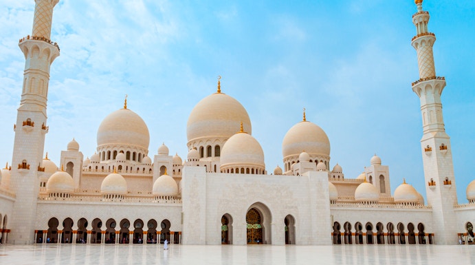 Sheikh Zayed Grand Mosque in Abu Dhabi with floral courtyard design.