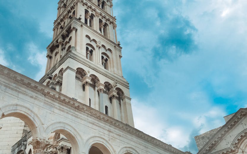 Bell tower of Diocletian's Palace in Split, Croatia, viewed from below.