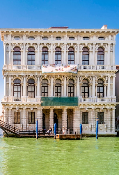 Ca' Rezzonico museum facade along the Grand Canal in Venice, Italy.