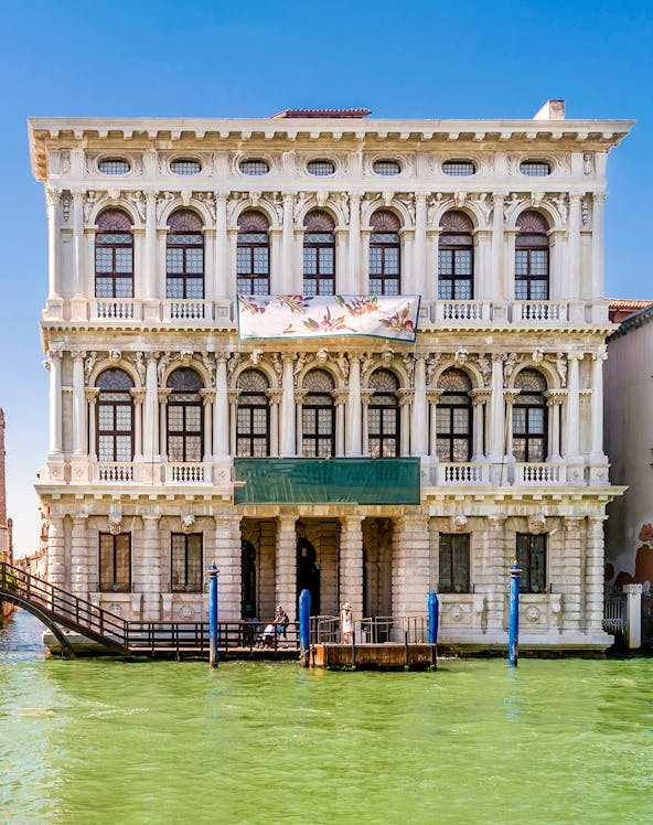 Ca' Rezzonico museum facade along the Grand Canal in Venice, Italy.