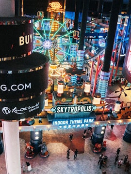 Genting Skytropolis Indoor Theme Park entrance with illuminated Ferris wheel.
