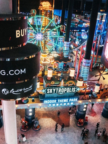 Genting Skytropolis Indoor Theme Park entrance with illuminated Ferris wheel.