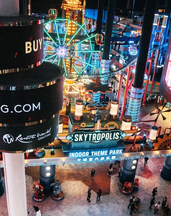 Genting Skytropolis Indoor Theme Park entrance with illuminated Ferris wheel.