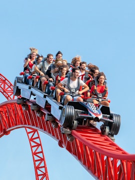 Roller coaster ride at Mirabilandia, Ravenna with passengers enjoying the thrill.
