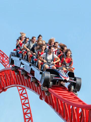 Roller coaster ride at Mirabilandia, Ravenna with passengers enjoying the thrill.