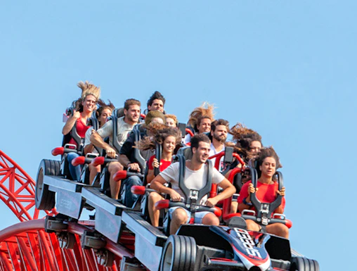 Roller coaster ride at Mirabilandia, Ravenna with passengers enjoying the thrill.