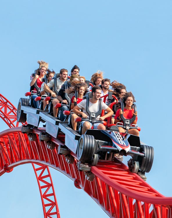 Roller coaster ride at Mirabilandia, Ravenna with passengers enjoying the thrill.