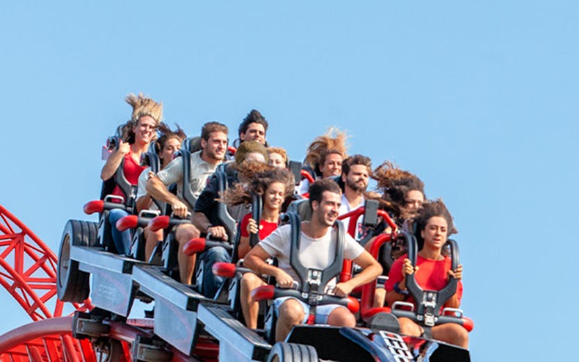 Roller coaster ride at Mirabilandia, Ravenna with passengers enjoying the thrill.