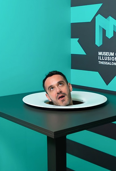 Head illusion exhibit at Museum of Illusions Athens.