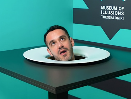 Head illusion exhibit at Museum of Illusions Athens.