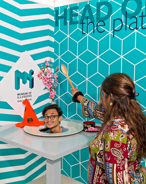 Head on a platter illusion at Museum of Illusions, Kuala Lumpur.