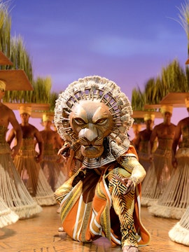 Lion-themed performer on stage in a Critics' Choice show.