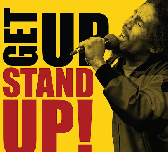Performer singing passionately with 'Get Up Stand Up' text, True Story Shows