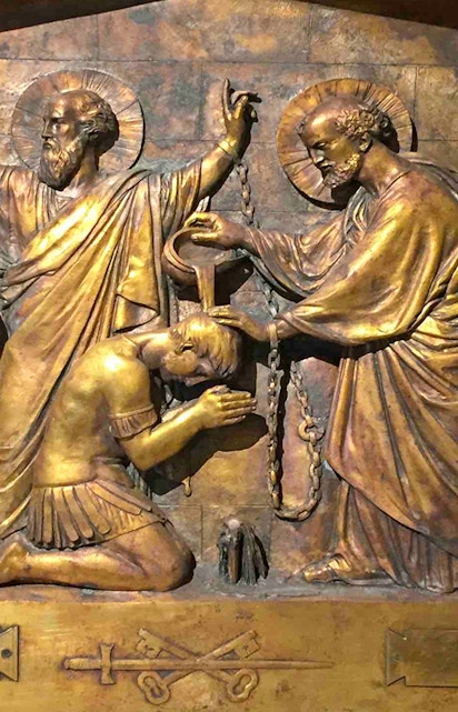 Relief sculpture depicting a biblical scene inside Mamertine Prison, Rome.