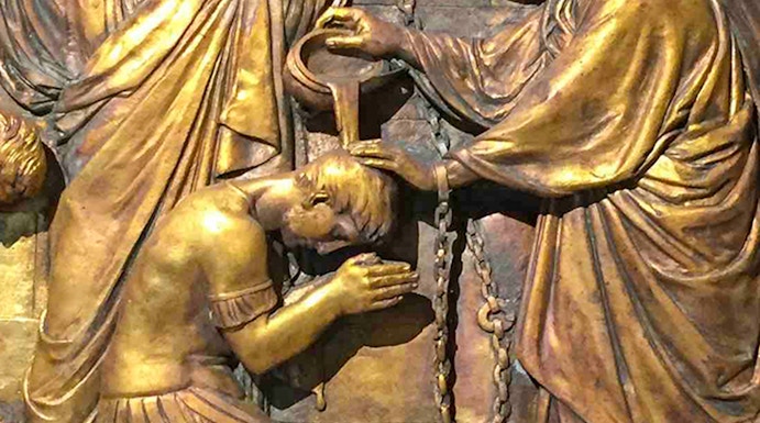 Relief sculpture depicting a biblical scene inside Mamertine Prison, Rome.