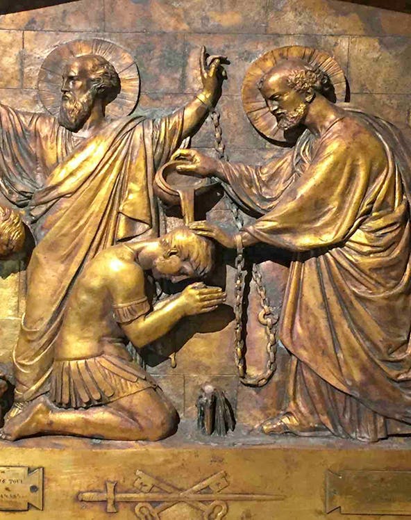 Relief sculpture depicting a biblical scene inside Mamertine Prison, Rome.