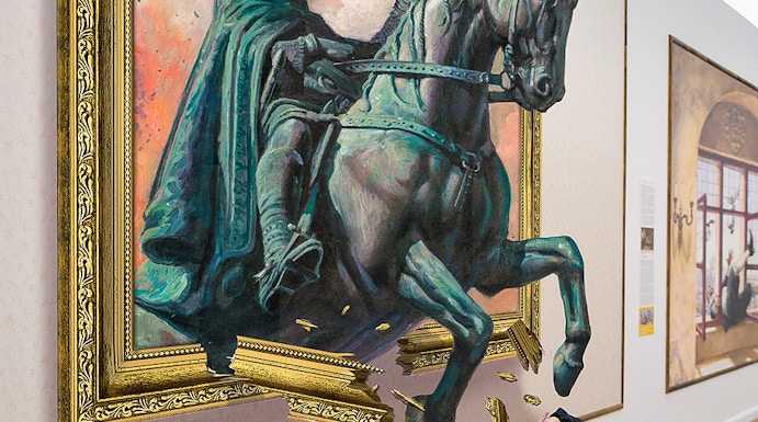 Illusion Art Museum visitor interacts with 3D painting of a knight on horseback.