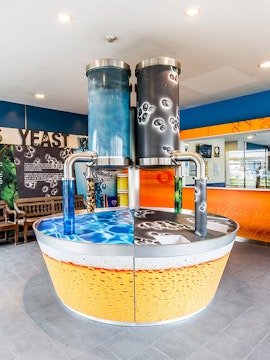 Beer brewing display at Tiger Brewery Singapore.