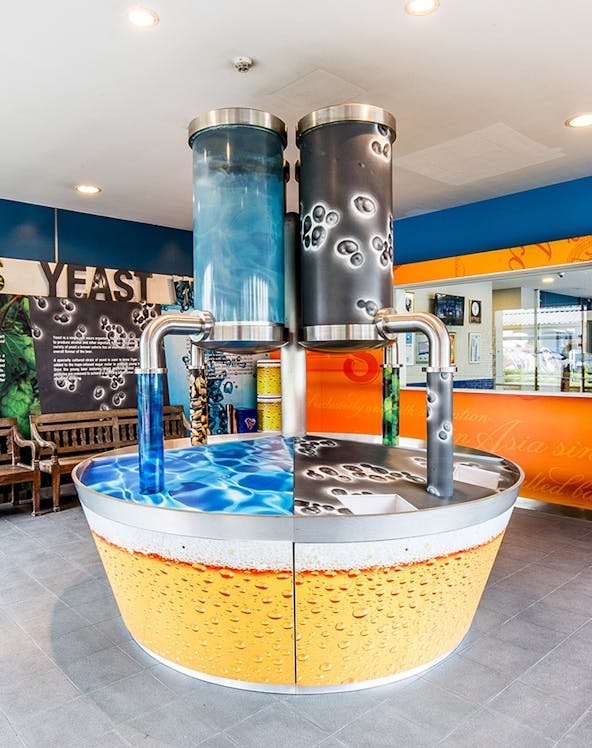 Beer brewing display at Tiger Brewery Singapore.