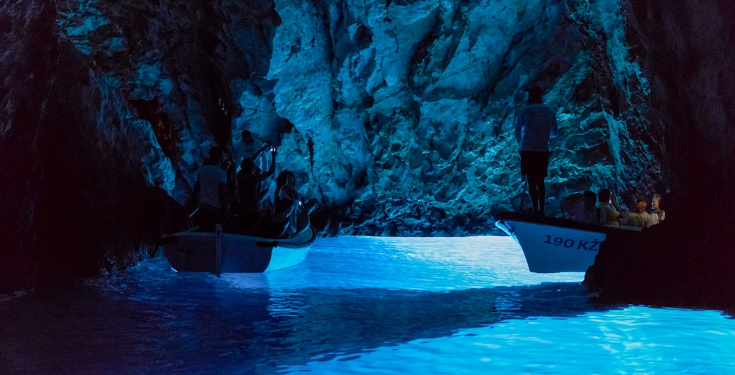 Boat entering Blue Cave on Biševo Island, Croatia during Blue Cave Tours.