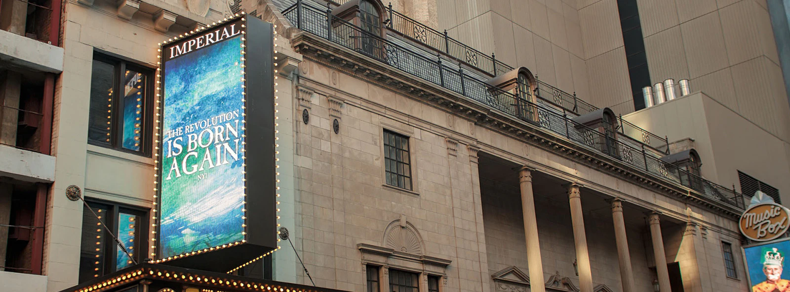 Imperial Theatre marquee in New York City displaying a Tony Award-winning show.