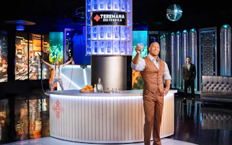 Dwayne Johnson statue holding a drink at Madame Tussauds Las Vegas.
