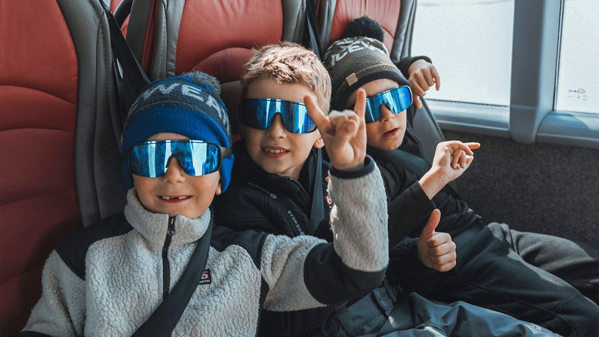 Kids enjoying Red Monster truck ride on Langjökull Glacier Tour from Gullfoss.