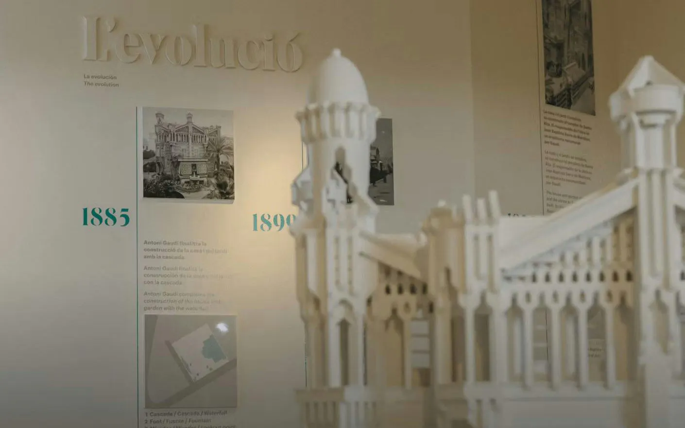Casa Vicens second floor exhibit with architectural model and historical timeline.