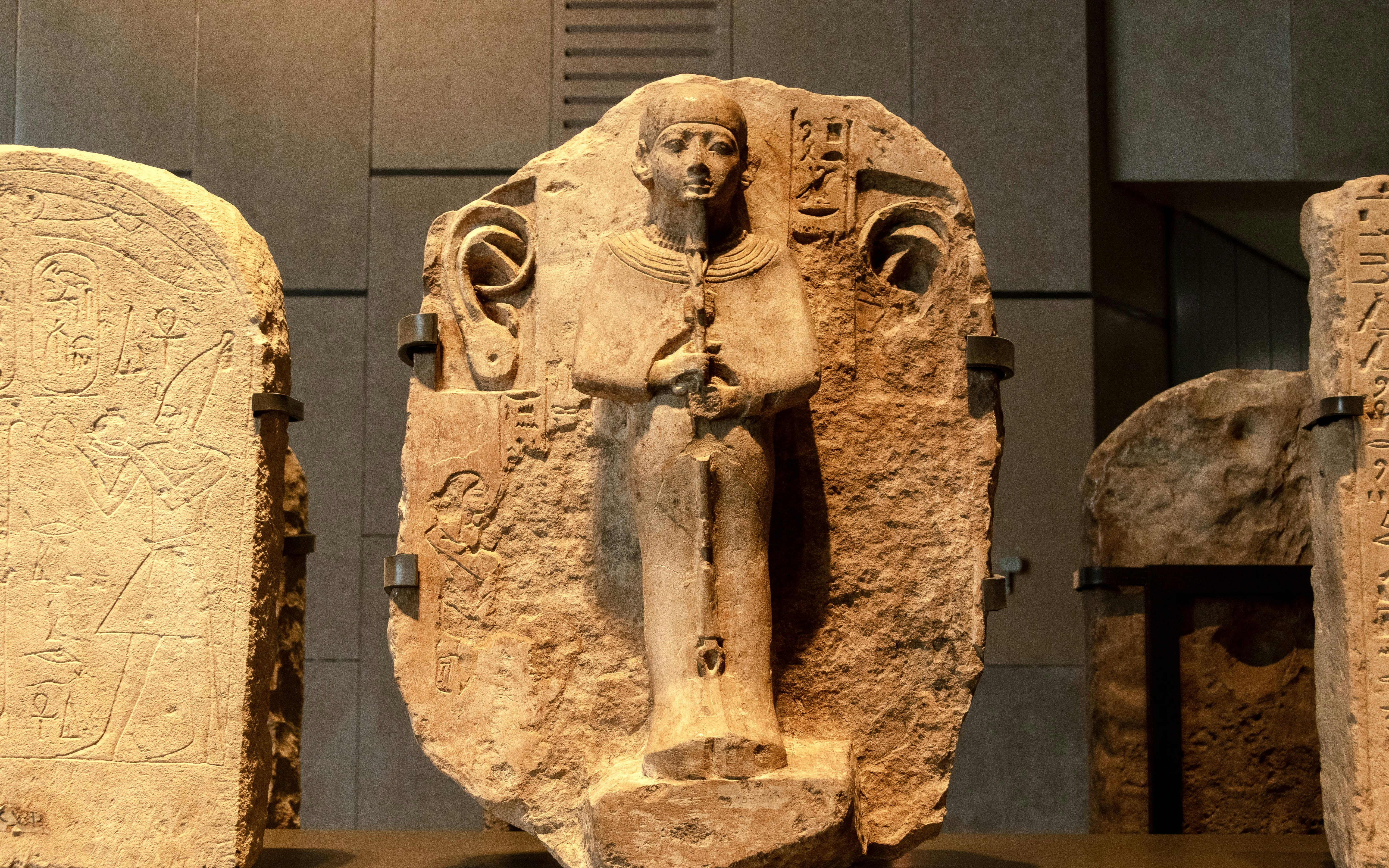 Statue of Ptah, "Ptah who listens to prayers," at Grand Egyptian Museum, Giza, Egypt.