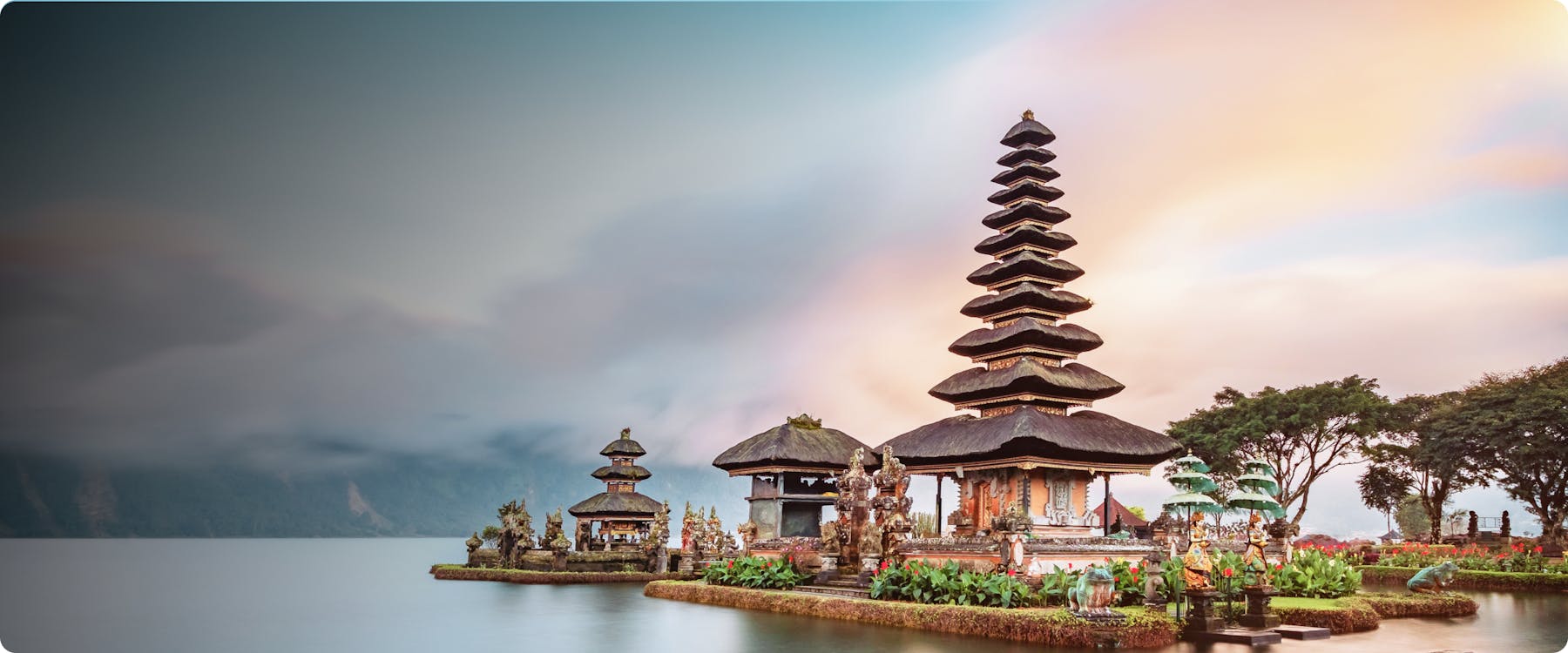 Ulun Danu Beratan Temple on Lake Beratan in Bali at sunrise.