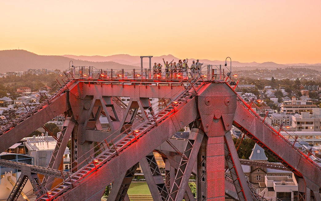 Climbers on Story Bridge during twilight in Brisbane, Australia.