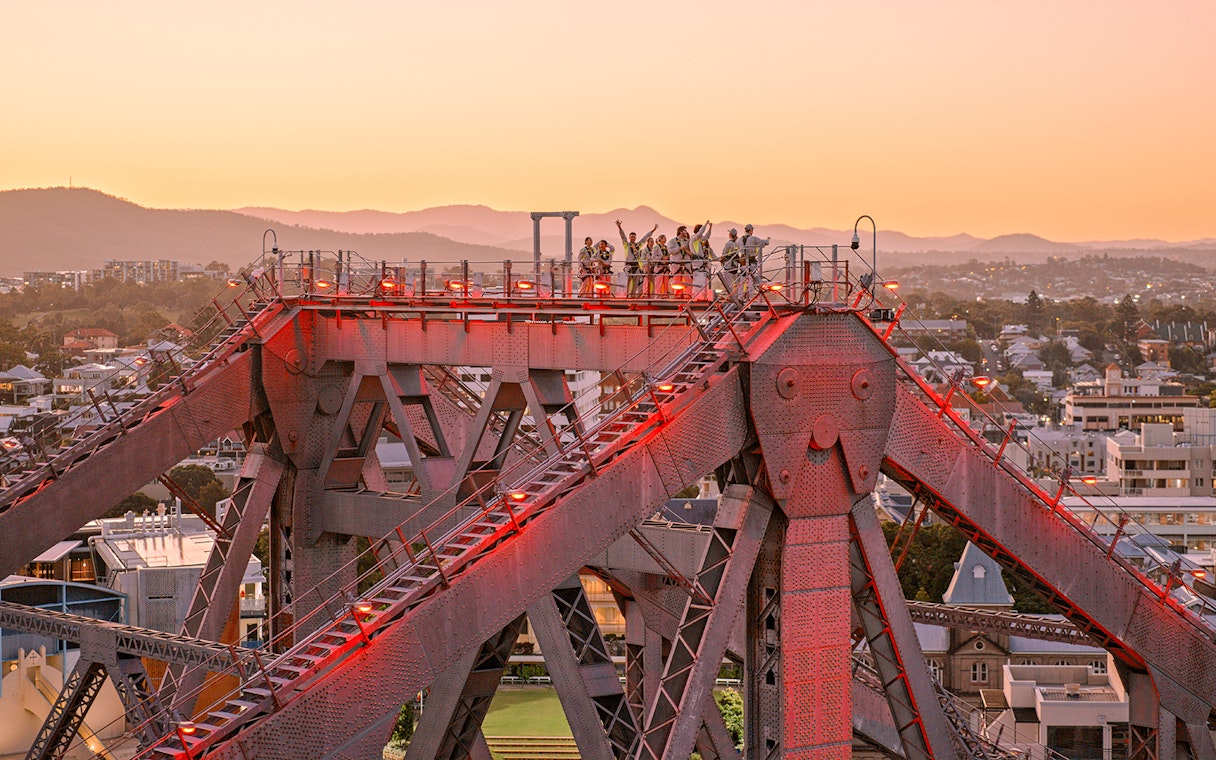 Climbers on Story Bridge during twilight in Brisbane, Australia.