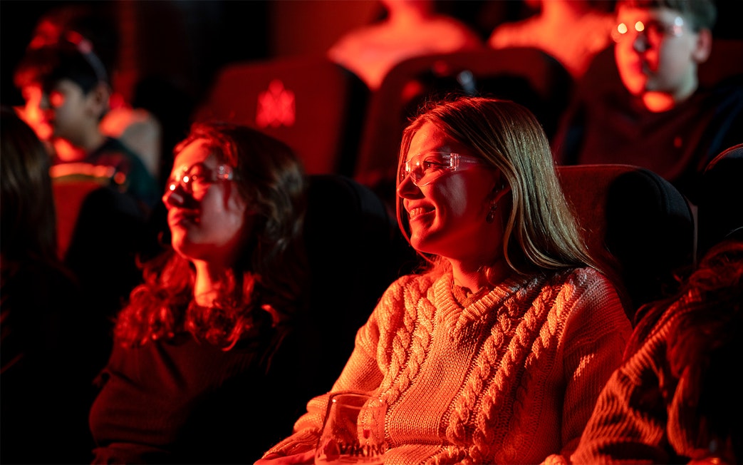 Guests watching the Lava show in Reykjavik theater.
