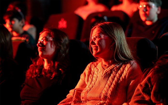 Guests watching the Lava show in Reykjavik theater.
