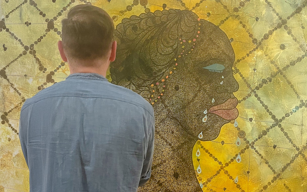 Guest viewing artwork on the Tate Britain Official Discovery Tour.