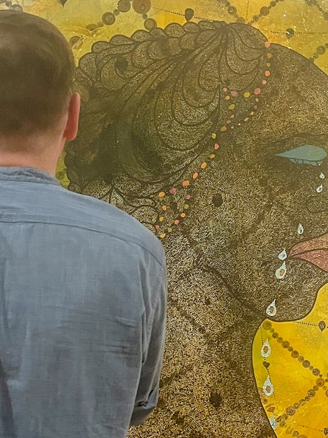 Guest viewing artwork on the Tate Britain Official Discovery Tour.