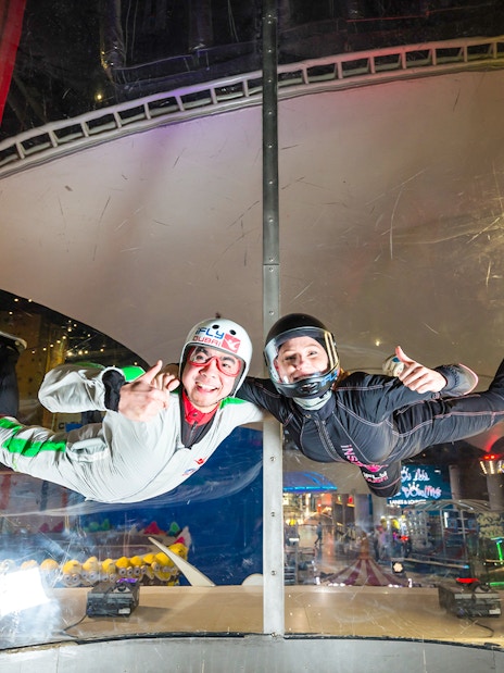 Person and instructor in iFly Dubai indoor skydive experience.