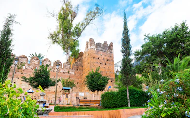 Kasbah of Chefchaouen with surrounding greenery, Morocco.