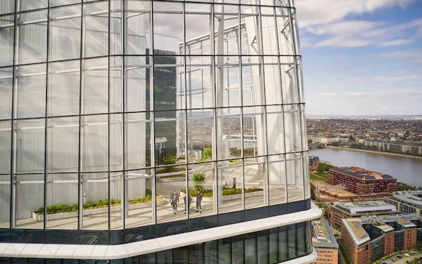 SkyDeck at MOL Campus overlooking Budapest cityscape and river.