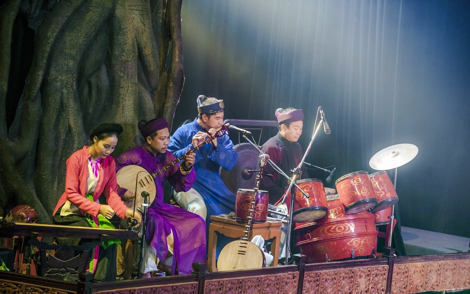 Musicians performing traditional instruments at Thang Long Water Puppet Show, Hanoi.