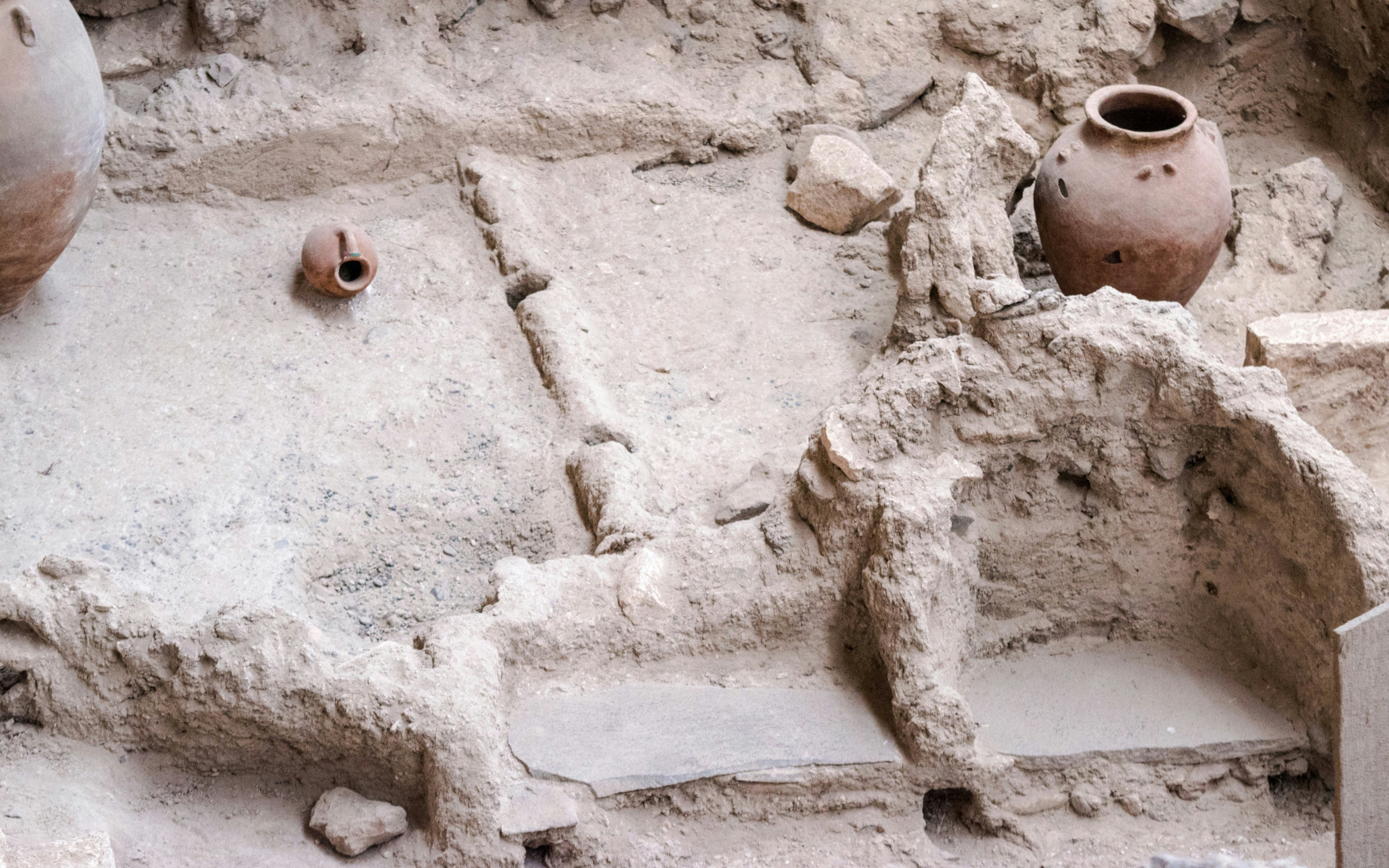 Ancient pottery and ruins at Akrotiri Archaeological Site, Santorini.