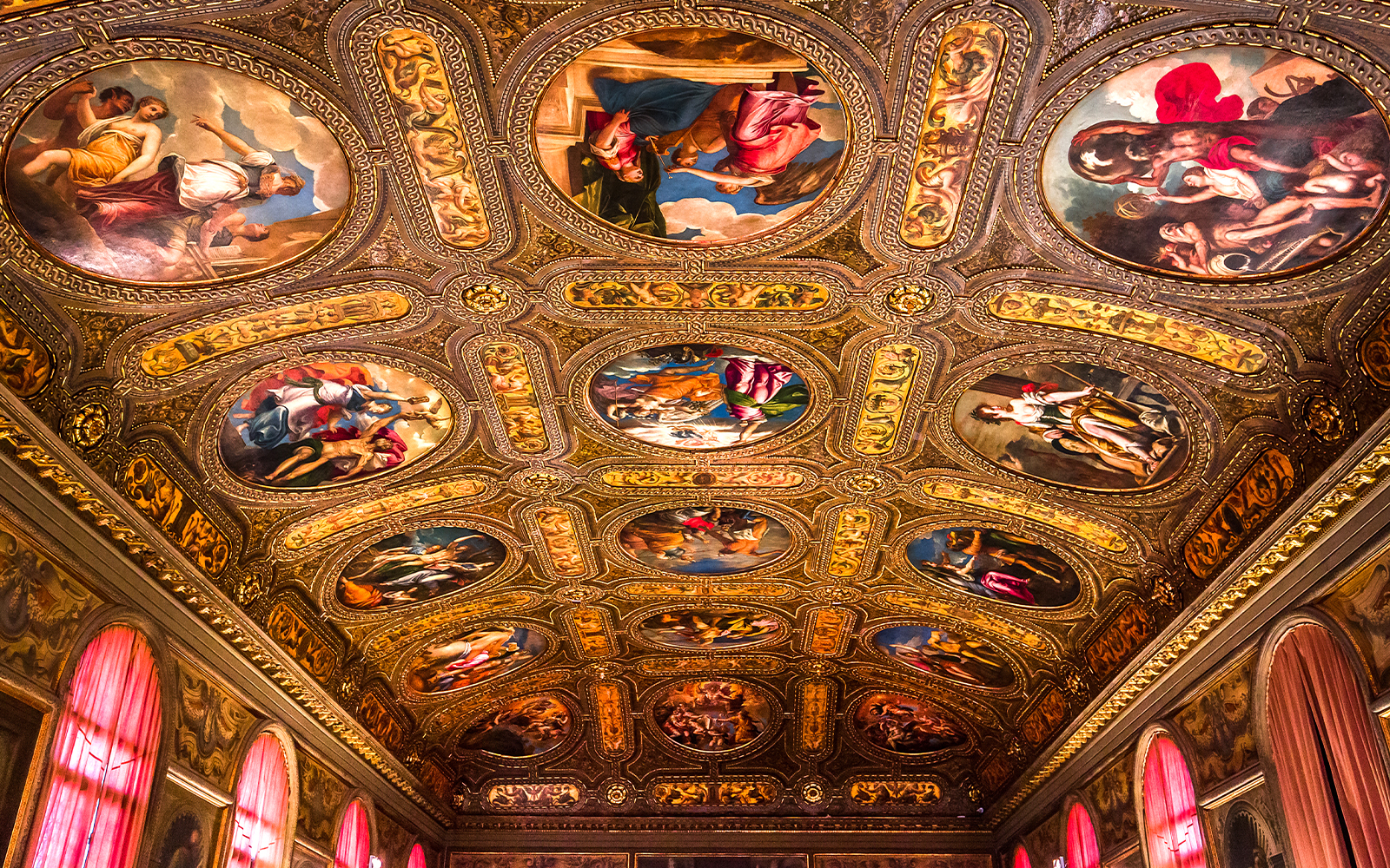 Ceiling frescoes and ornate details in Biblioteca Marciana, Venice, Italy.