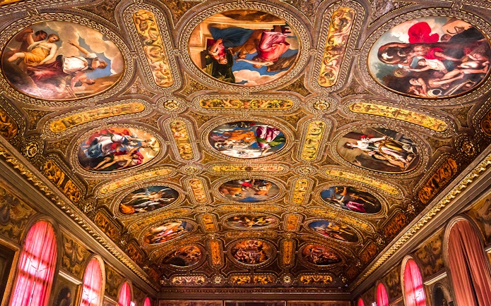 Ceiling frescoes and ornate details in Biblioteca Marciana, Venice, Italy.