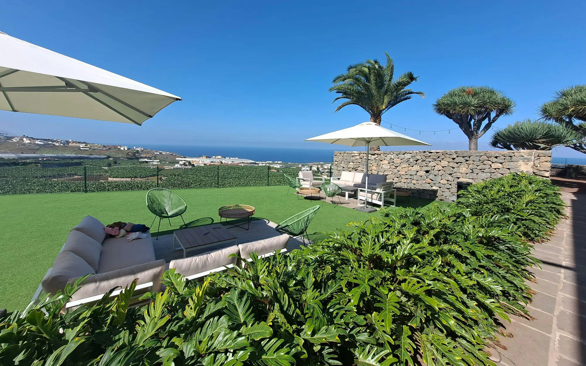Gran Canaria Banana World terrace with ocean view and seating area.