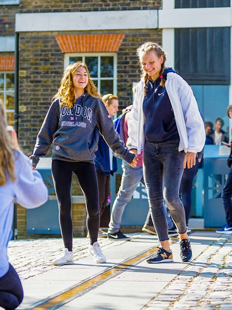 Guests standing on the Prime Meridian line at Royal Observatory Greenwich.