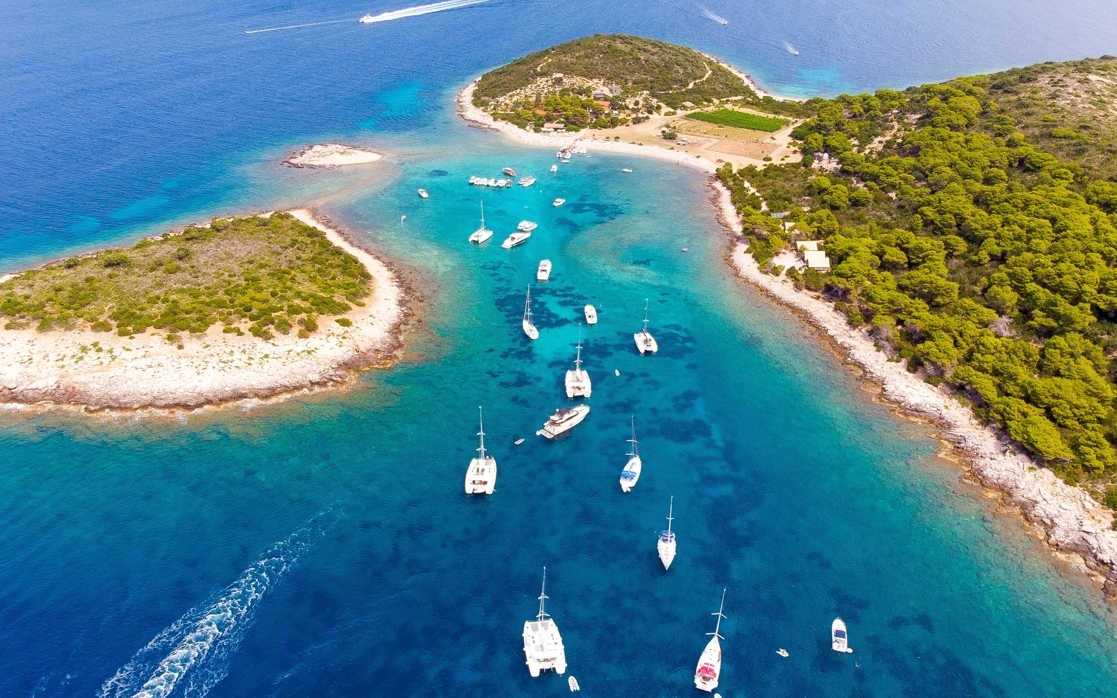 Yachts anchored near Budikovac Island, Vis, Croatia during yacht week.